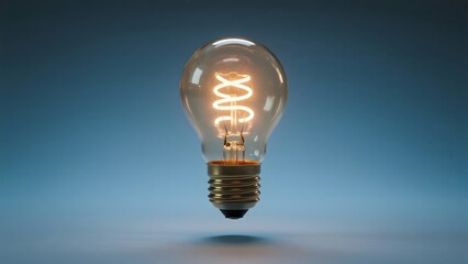 Illuminated Light Bulb with Spiral Filament Against a Gradient Background