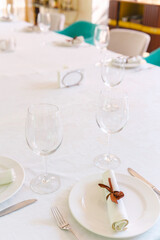 Elegant dining table set for special occasion in vibrant restaurant setting