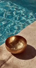 Golden bowl beside a pool (1)