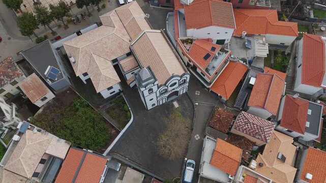 Aerial Drone Top Down View of Church Jardim do Mar in Jardim do Mar, Madeira, Portugal on a Cloudy Spring Day.