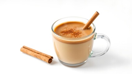 A glass mug of chai tea with cinnamon sticks