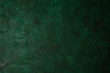 Olive green grunge wall with rough aged plaster texture