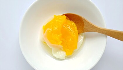 Soft-boiled egg with orange sauce