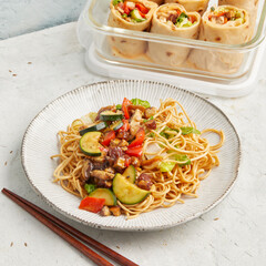 Tortillas and Asian noodle stir-fry
