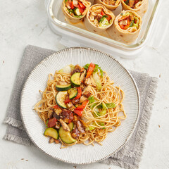Tortillas and Asian noodle stir-fry