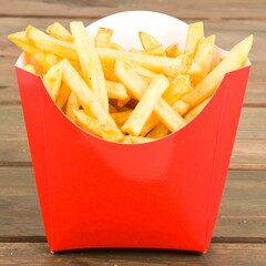 Crispy french fries in a red box