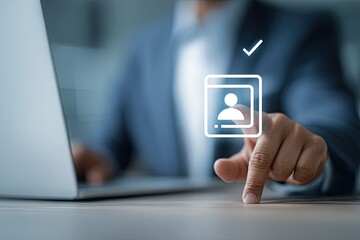 Businessperson interacts with digital profile icon on a laptop
