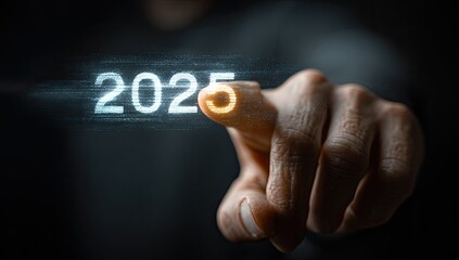 A finger points at the year 2025, projected as a digital overlay