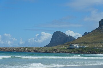 Fototapeta premium Coastal Landscape with Mountains and House