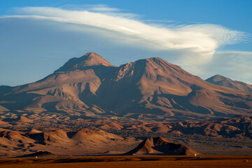 Peak with lenticular clouds Atacama desert Chile