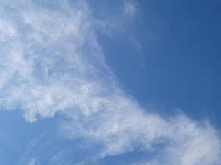 White Wispy Clouds on Blue Sky
