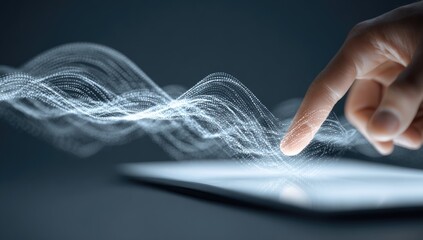 A hand interacts with a digital tablet displaying abstract data waves