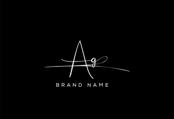 AG letter beauty cursive handwriting logo.