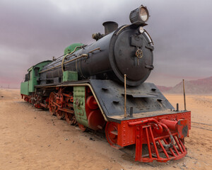 Fototapeta premium Vintage steam engine in the desert in Jordan