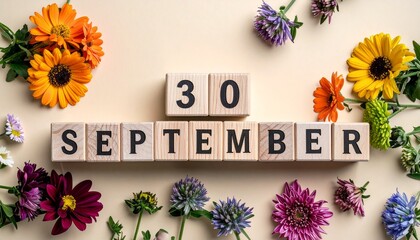 Wooden Blocks with Date 30 September. Floral Calendar – Vibrant Flowers on Solid Colored Background