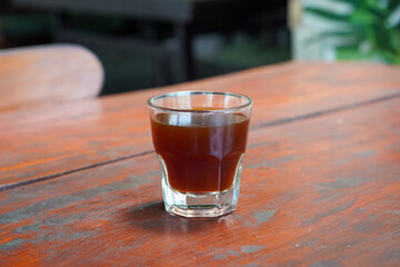 Arabica V60, captured on September 2, 2025. Hand-brewed Arabica coffee using V60 pour-over method, hot black coffee in glass server and ceramic cup, minimalist modern café style lifestyle photography