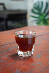 Arabica V60, captured on September 2, 2025. Hand-brewed Arabica coffee using V60 pour-over method, hot black coffee in glass server and ceramic cup, minimalist modern café style lifestyle photography