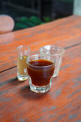 Arabica V60, captured on September 2, 2025. Hand-brewed Arabica coffee using V60 pour-over method, hot black coffee in glass server and ceramic cup, minimalist modern café style lifestyle photography