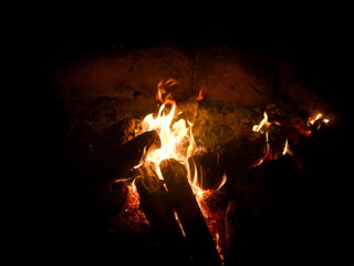 View of a campfire, night, close-up, no people.