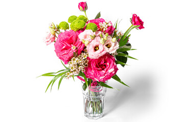 bouquet of flowers in vase on the white background
