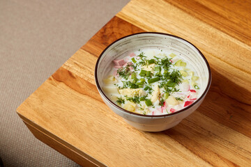 Indulge in a Delicious Bowl of Fresh, Creamy Soup Elevated with Aromatic Herbs and Fresh Vegetables