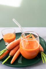 Glass of fresh carrot juice