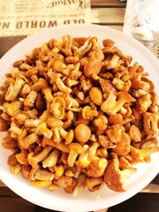 plate with yellow mushrooms on it