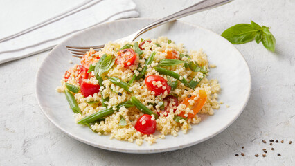 Millet with cherry tomatoes and beans