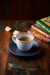 Cup of coffee on wooden background. Soft focus. Copy space	