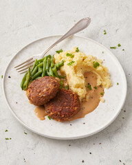 Lentil patties with mashed potatoes