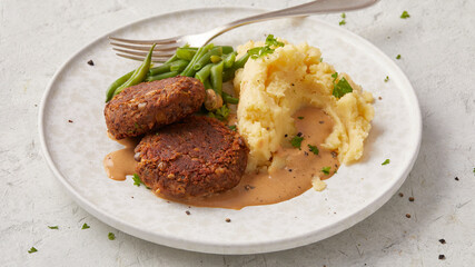 Lentil patties with mashed potatoes