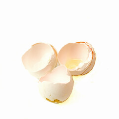 Broken eggshells from three eggs isolated on white background.