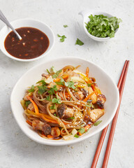 Vegetable stir-fry with chili sauce and glass noodles