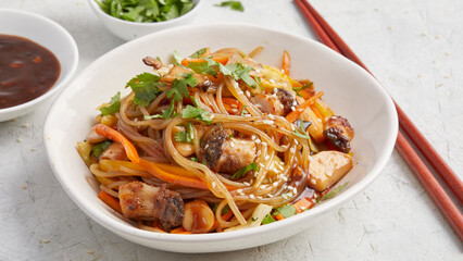 Vegetable stir-fry with chili sauce and glass noodles