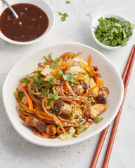 Vegetable stir-fry with chili sauce and glass noodles