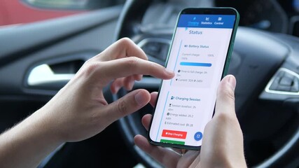 Close-up of hands in a car monitoring the completion of an EV charging session via a mobile app, followed by analyzing the session data and expense. - Powered by Adobe