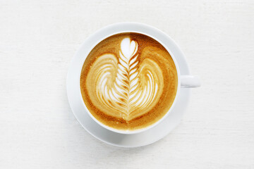  a cup of latte art coffee isolated on white background                                                                                                                                                 