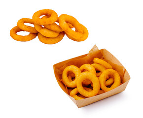 Delicious onion rings served in a paper container and on a plate