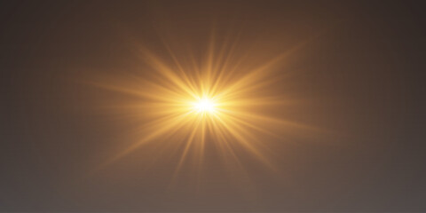 Obraz premium Bright golden lens flare with luminous rays and optical flares.