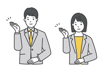 笑顔でポーズをとる男女ビジネスパーソン