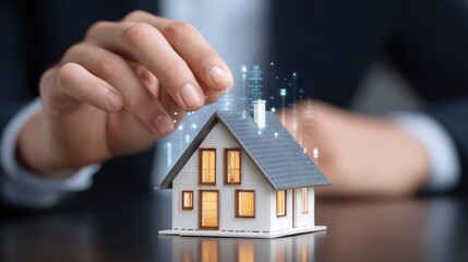 Hand miniature house technology real estate investment smart home digital innovation property futuristic. person hand interacts with small house model glowing digital elements suggest smart home