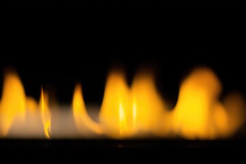 Blurred flames dancing against a dark background