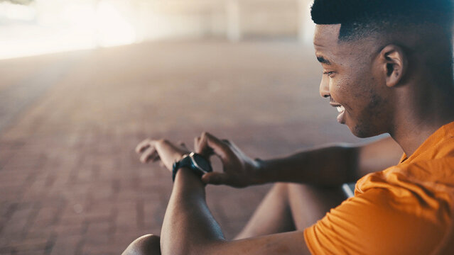Happy, black man and checking watch with fitness counter for sport app, tracking or perofrmance. Space, male person or smile with wristwatch for monitoring steps, heart rate or workout break in town - Powered by Adobe