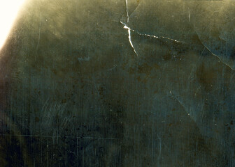 Vintage dirty grunge film texture. Aged torn black scratched photo. Glitch effect.