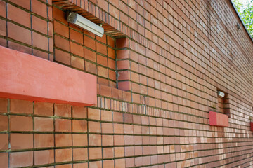 Bricks and colorful accents create a modern architectural design in an urban setting