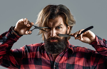 Bearded man, bearded male. Portrait of stylish man beard. Barber scissors and straight razor, barber shop. Vintage barbershop, shaving