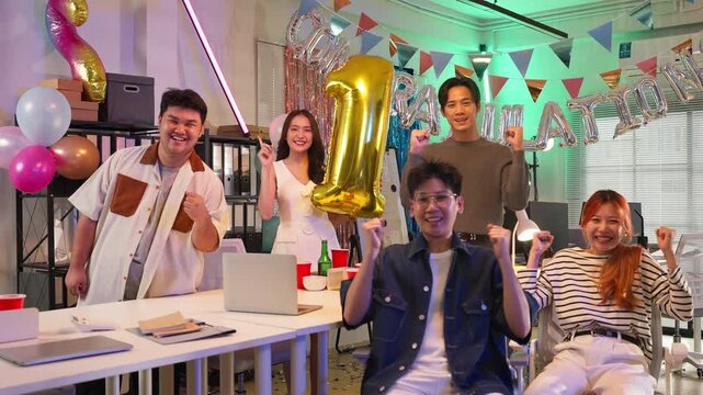 Asian office professionals celebrate extraordinary super sell success achieving coveted number one first prize recognition through dedicated teamwork collaboration strategic planning innovative market