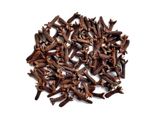 A pile of fresh dried brown cloves isolated on white background. Spice cloves. Close up of dried aromatic clove flower buds. Top view.