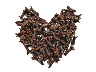 A pile of fresh dried brown cloves isolated on white background. Spice cloves. Close up of dried aromatic clove flower buds. Top view.