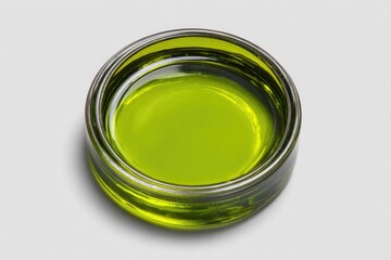 Clear glass bowl filled with bright green liquid